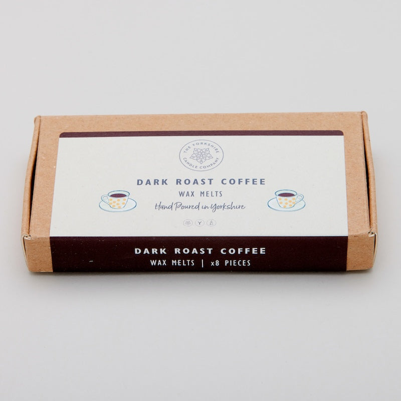 Box of dark roast coffee wax melts on a light gray background