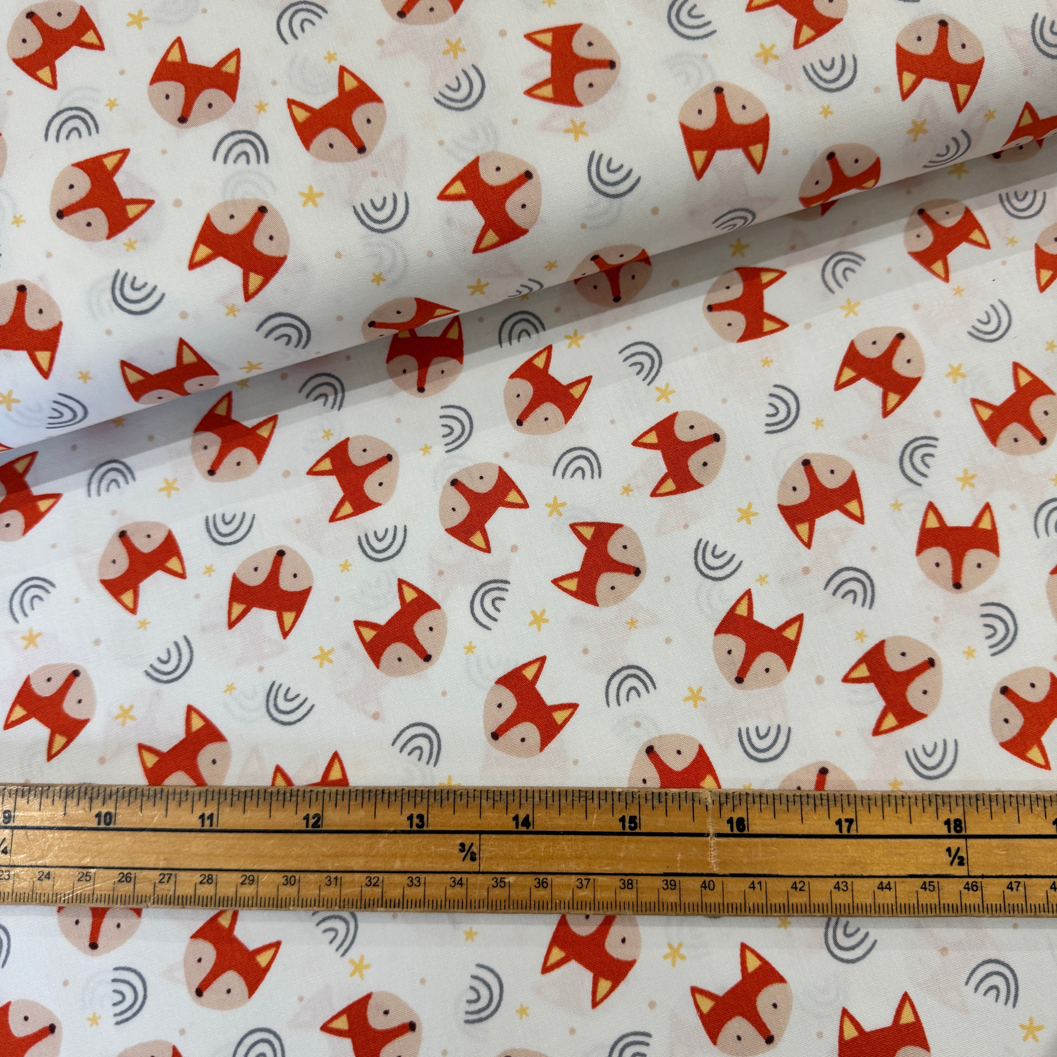 Rose & Hubble Fox Heads on Ivory Cotton Poplin Fabric at Bibelot