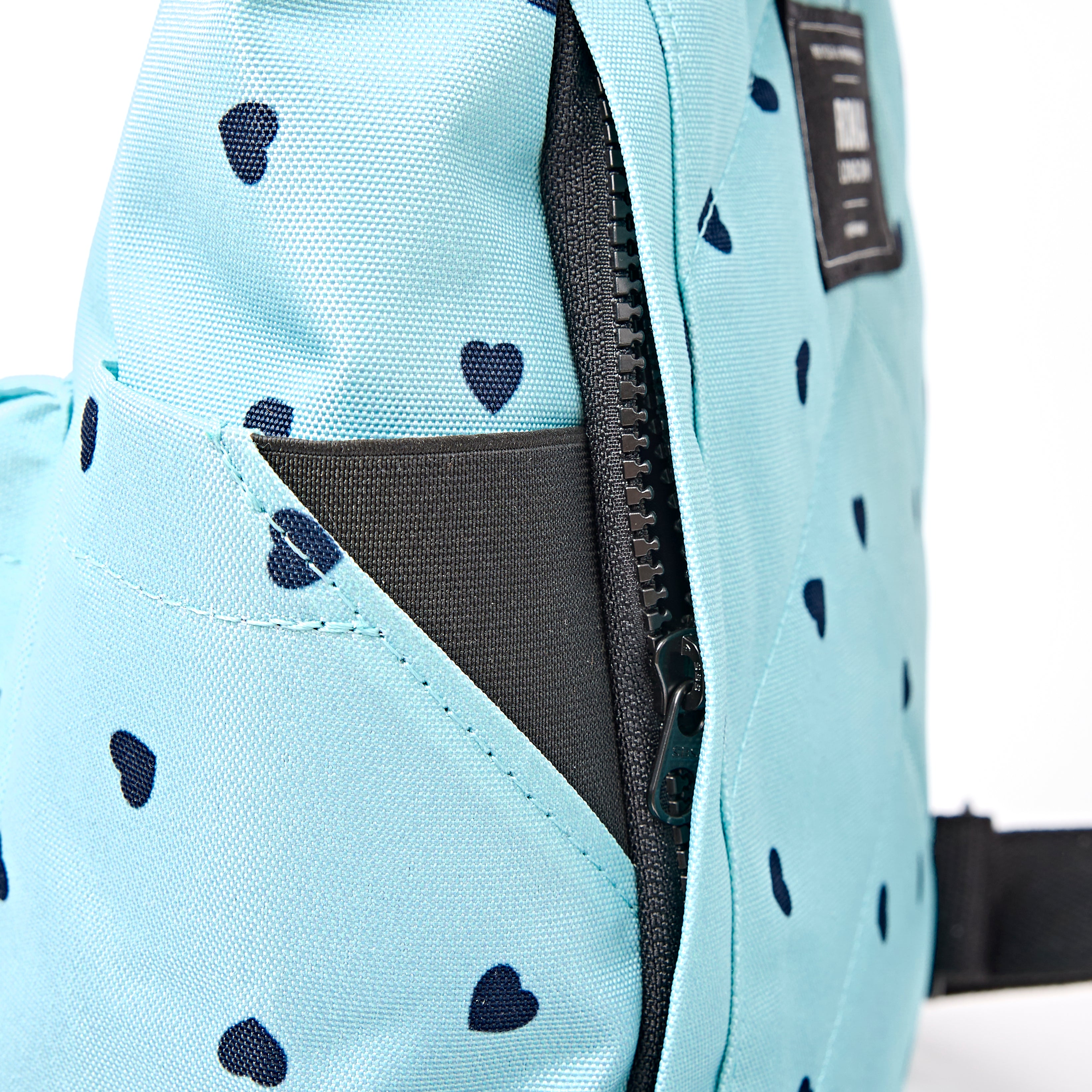 ROKA Canfield Roll Top Small Backpack – Heart Print Recycled Canvas at Bibelot Leek UK Stockist