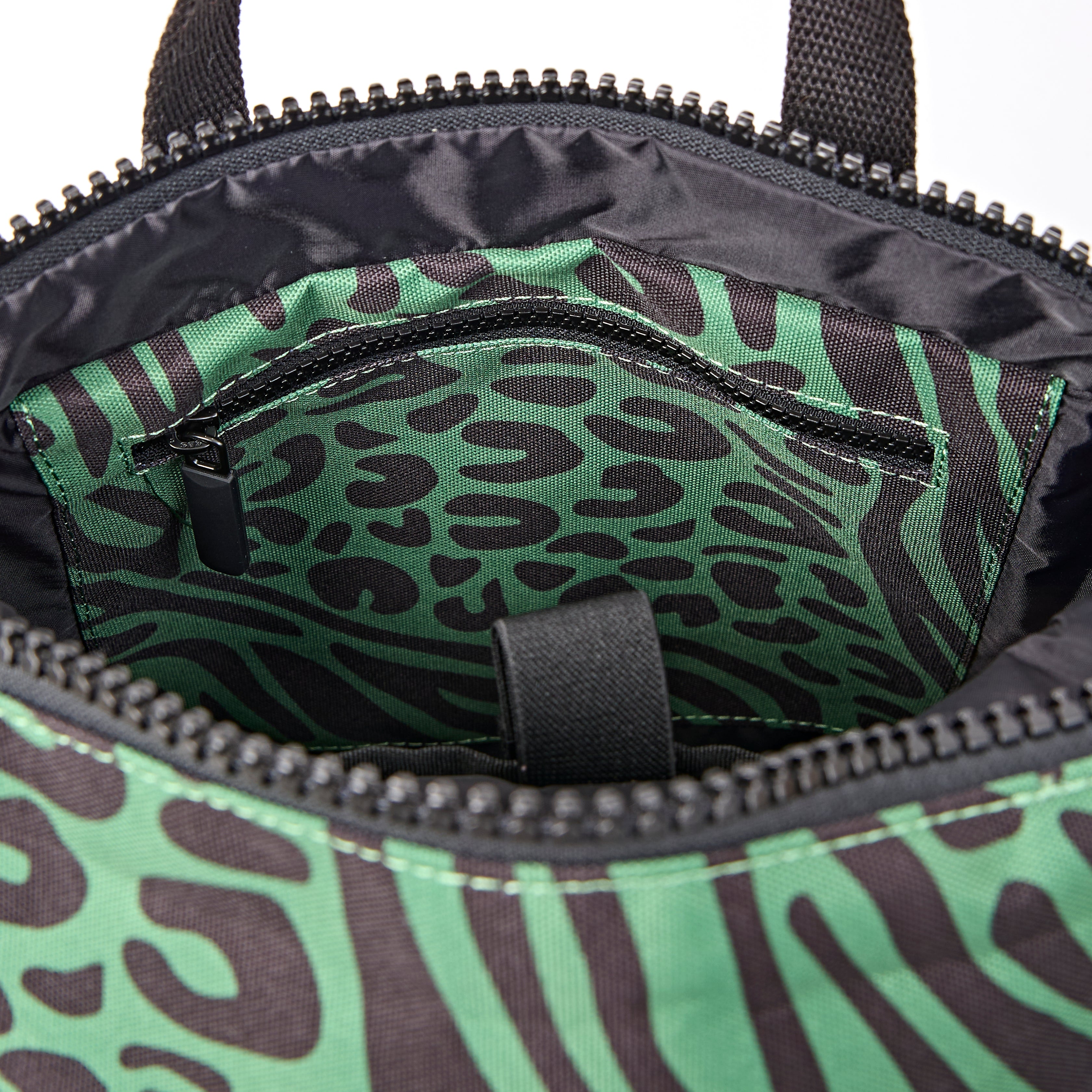 ROKA Canfield Roll Top Small Backpack – Mixed Animal Artichoke Recycled Canvas at Bibelot Leek UK Stockist