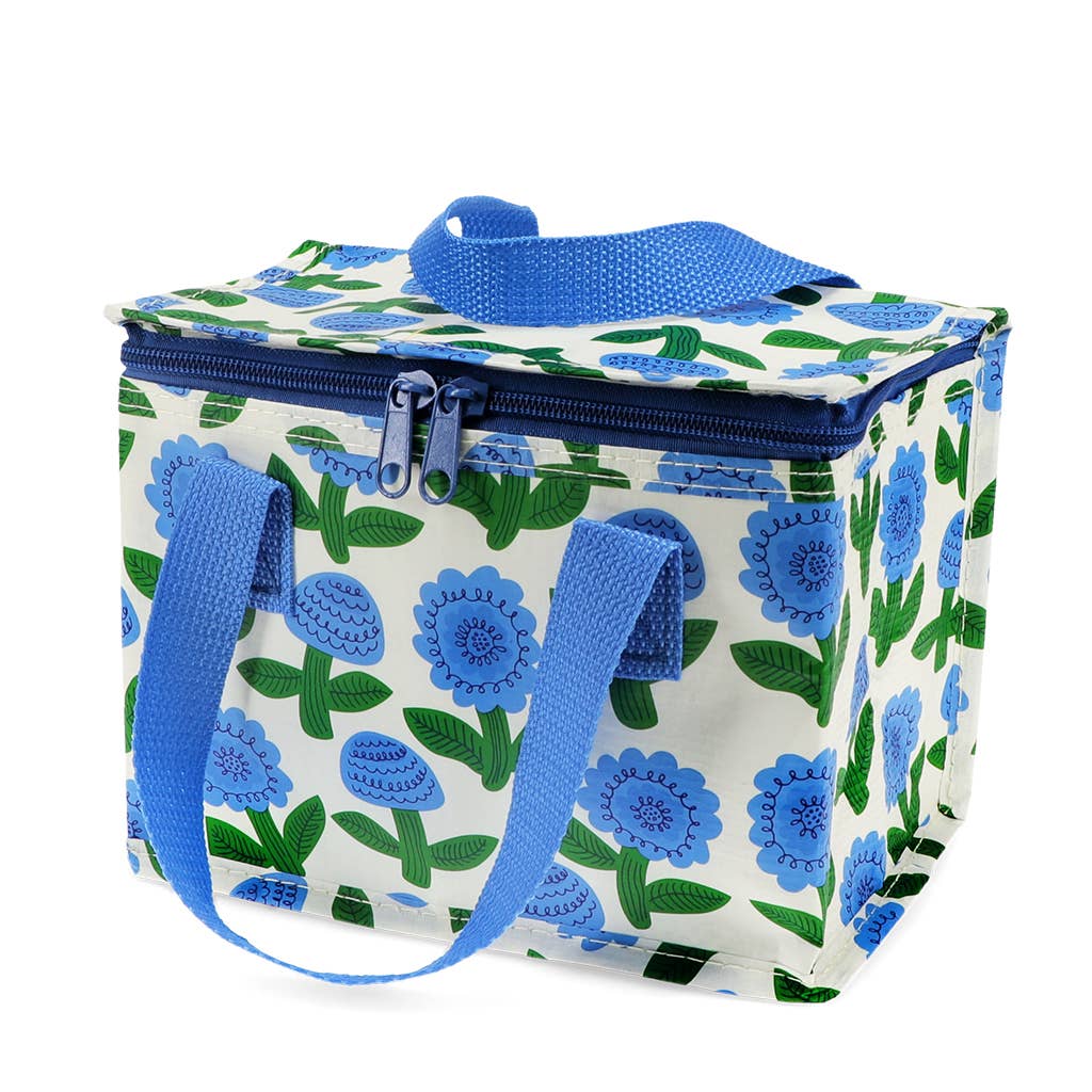 Floral-patterned cooler bag with blue handles on a white background