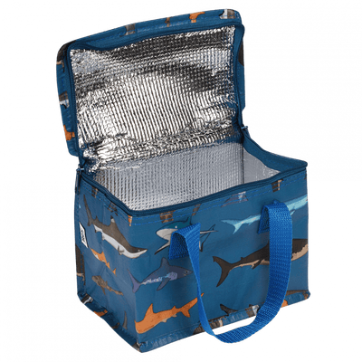 Blue insulated cooler bag with shark pattern on a green background