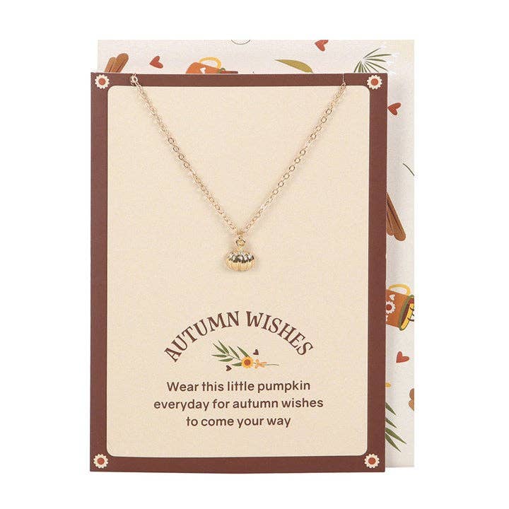 Necklace with pumpkin charm on an 'Autumn Wishes' card