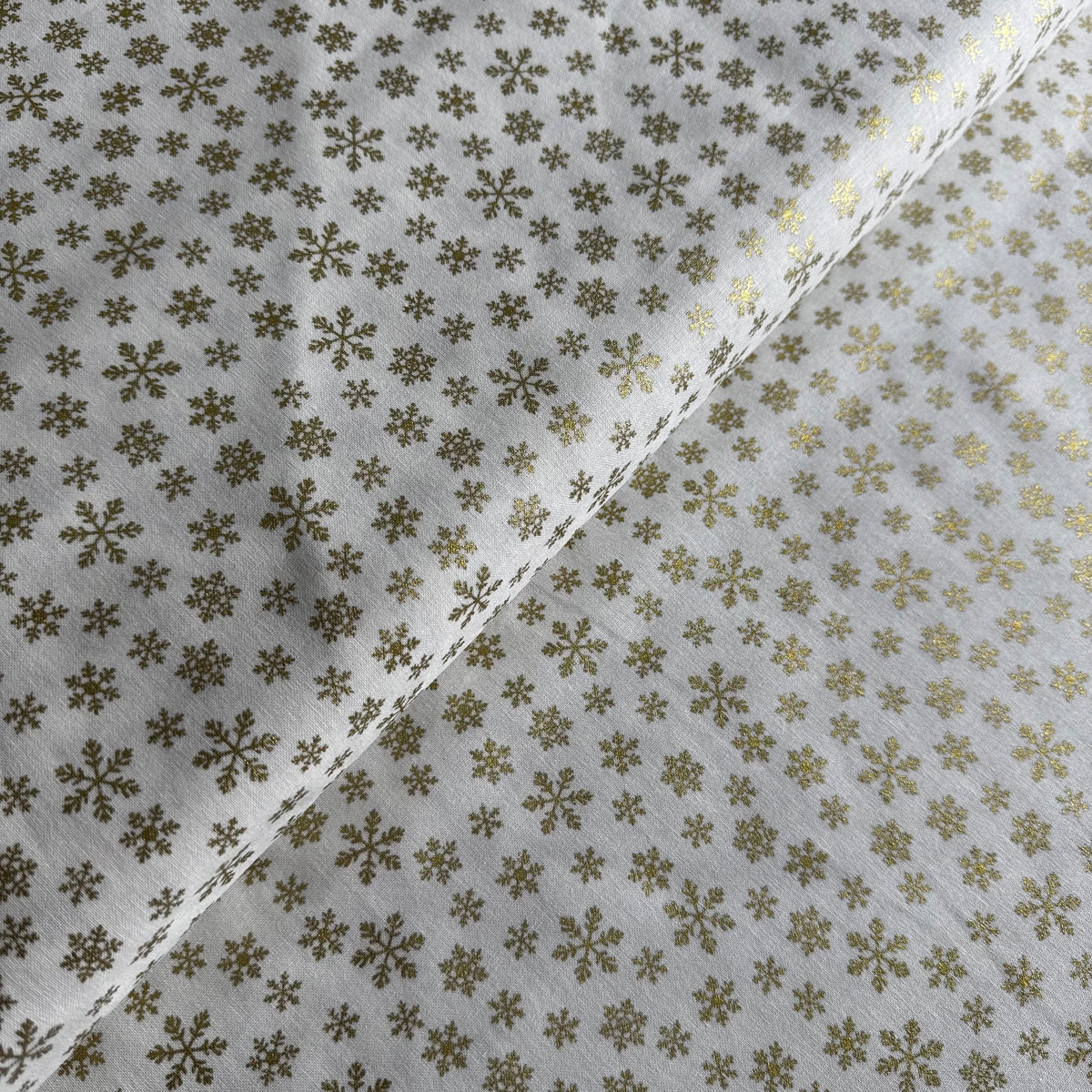 John Louden Christmas Gold Snowflakes on Cream Cotton Fabric at Bibelot Leek