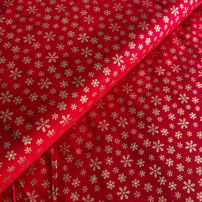 John Louden Christmas Gold Snowflakes on Red Cotton Fabric at Bibelot Leek