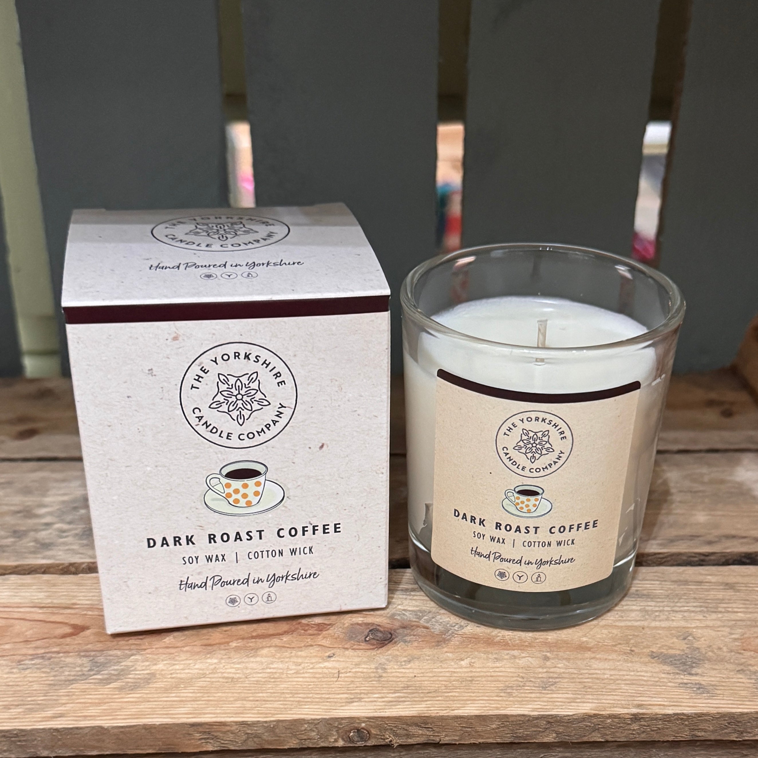 Candle tin labeled 'Dark Roast Coffee' with a white background