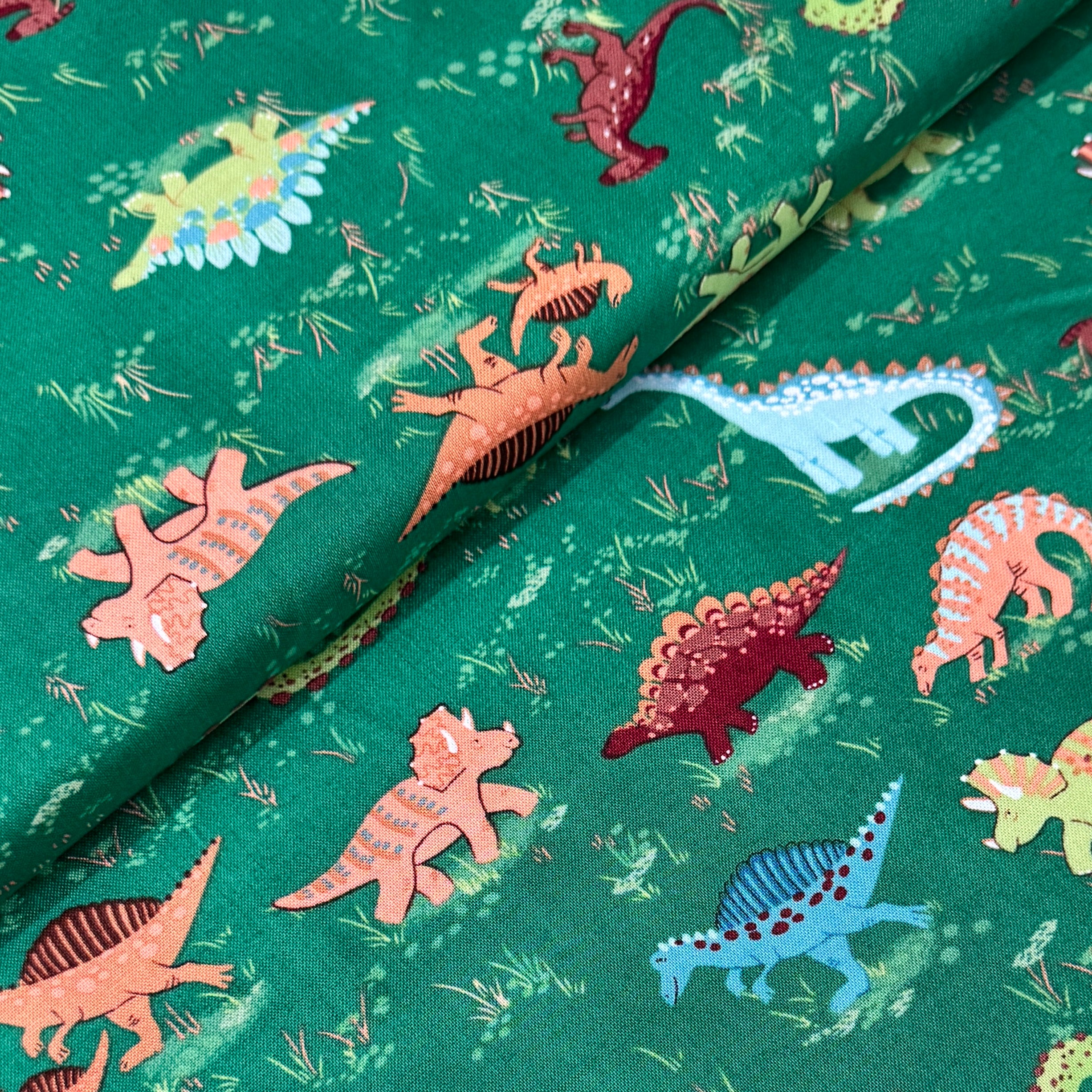 Makower Prehistoric Roam Green 166/G Cotton Fabric at Bibelot, Leek