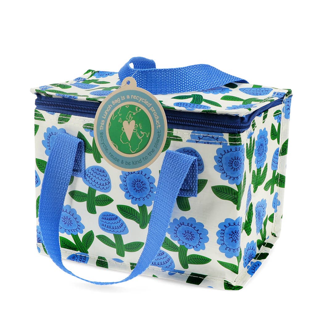 Floral-patterned cooler bag with blue handles on a white background