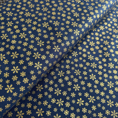 John Louden Christmas Gold Snowflakes on Navy Cotton Fabric at Bibelot Leek