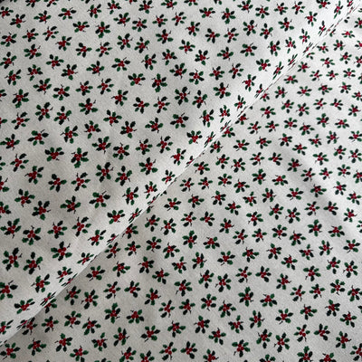 John Louden Christmas Holly on Cream Cotton Fabric at Bibelot Leek