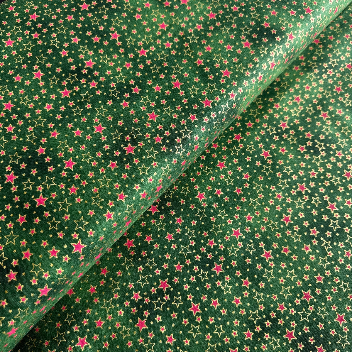 John Louden Christmas Multi Stars on Green Cotton Fabric at Bibelot Leek
