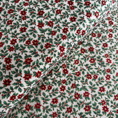 John Louden Christmas Poinsettia Sprigs on Cream Cotton Fabric at Bibelot Leek