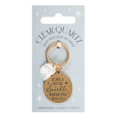 Keychain with motivational tag on a clear quartz keyring packaging