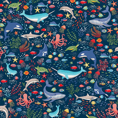 Colorful underwater pattern with whales, fish, and sea creatures on a dark blue background
