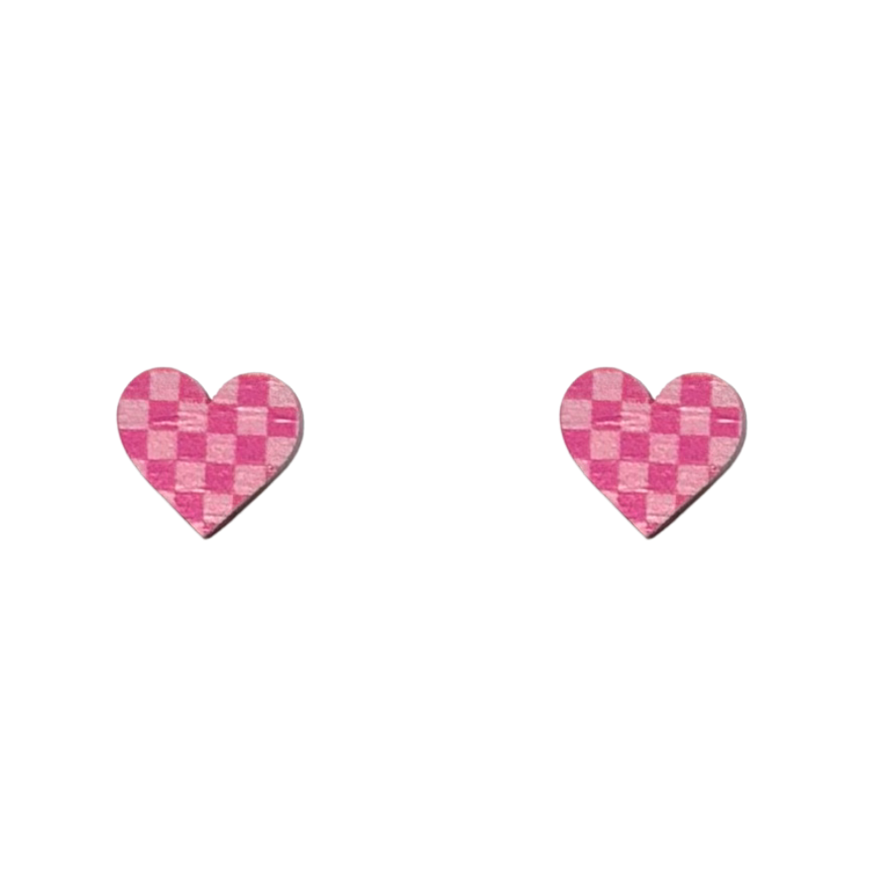 Pair of pink checkered heart-shaped earrings on a white background