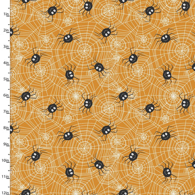 Fabric with spider and web pattern on an orange background, measured in inches.