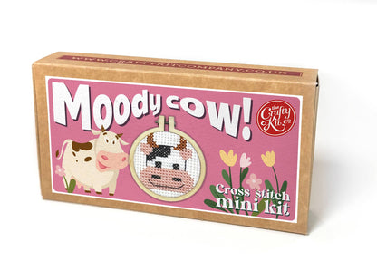 Box for 'Moody Cow!' cross stitch mini kit by The Crafty Kit Company on a white background