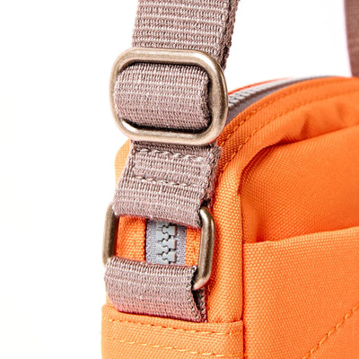 Roka Bond Crossbody Recycled Canvas: Jaffa Orange at Bibelot Leek