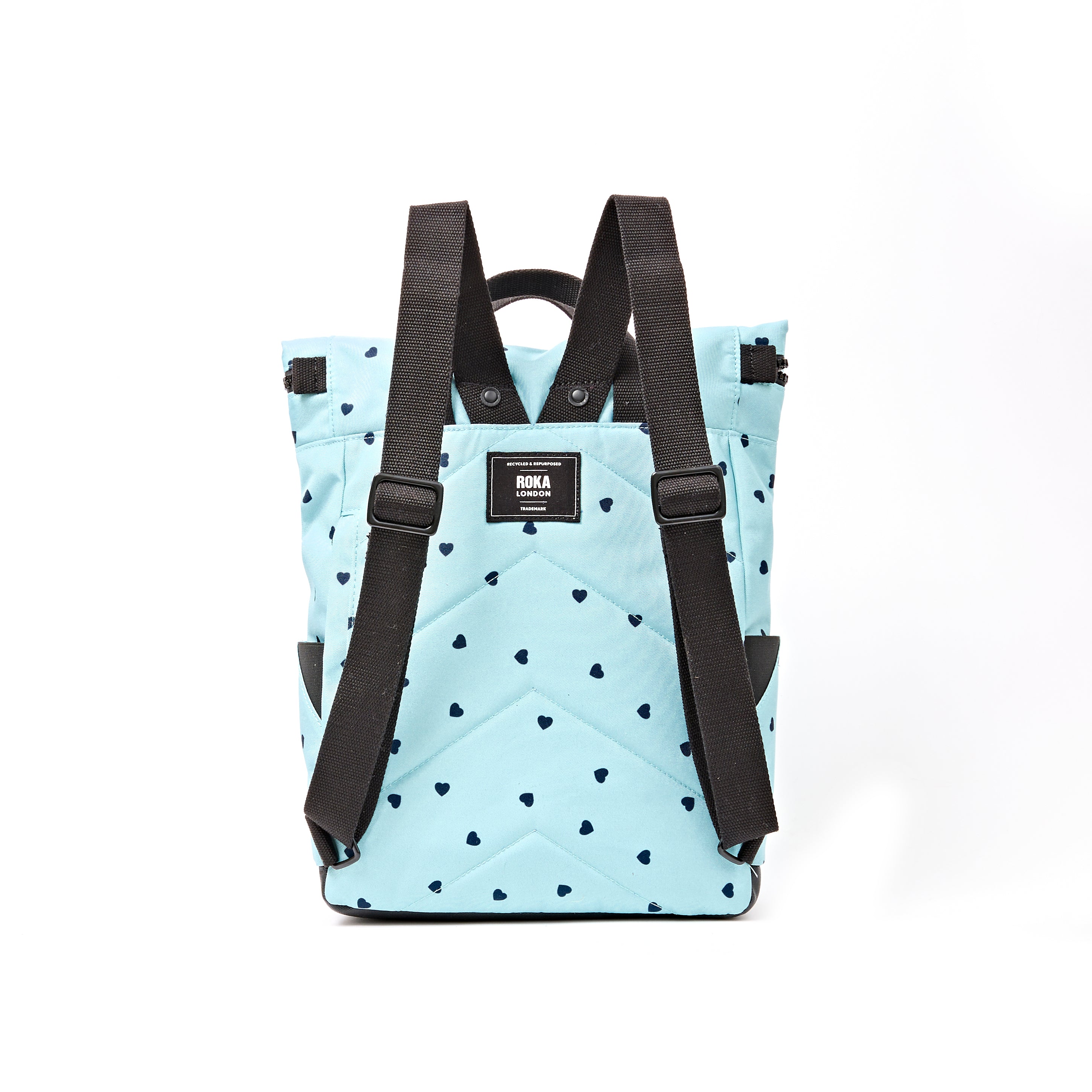 ROKA Canfield Roll Top Medium Backpack – Heart Print Recycled Canvas at Bibelot Leek UK Stockist