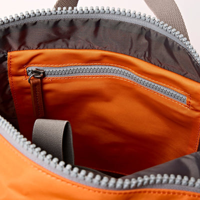 Roka Medium Canfield B Recycled Nylon: Jaffa Orange at Bibelot Leek