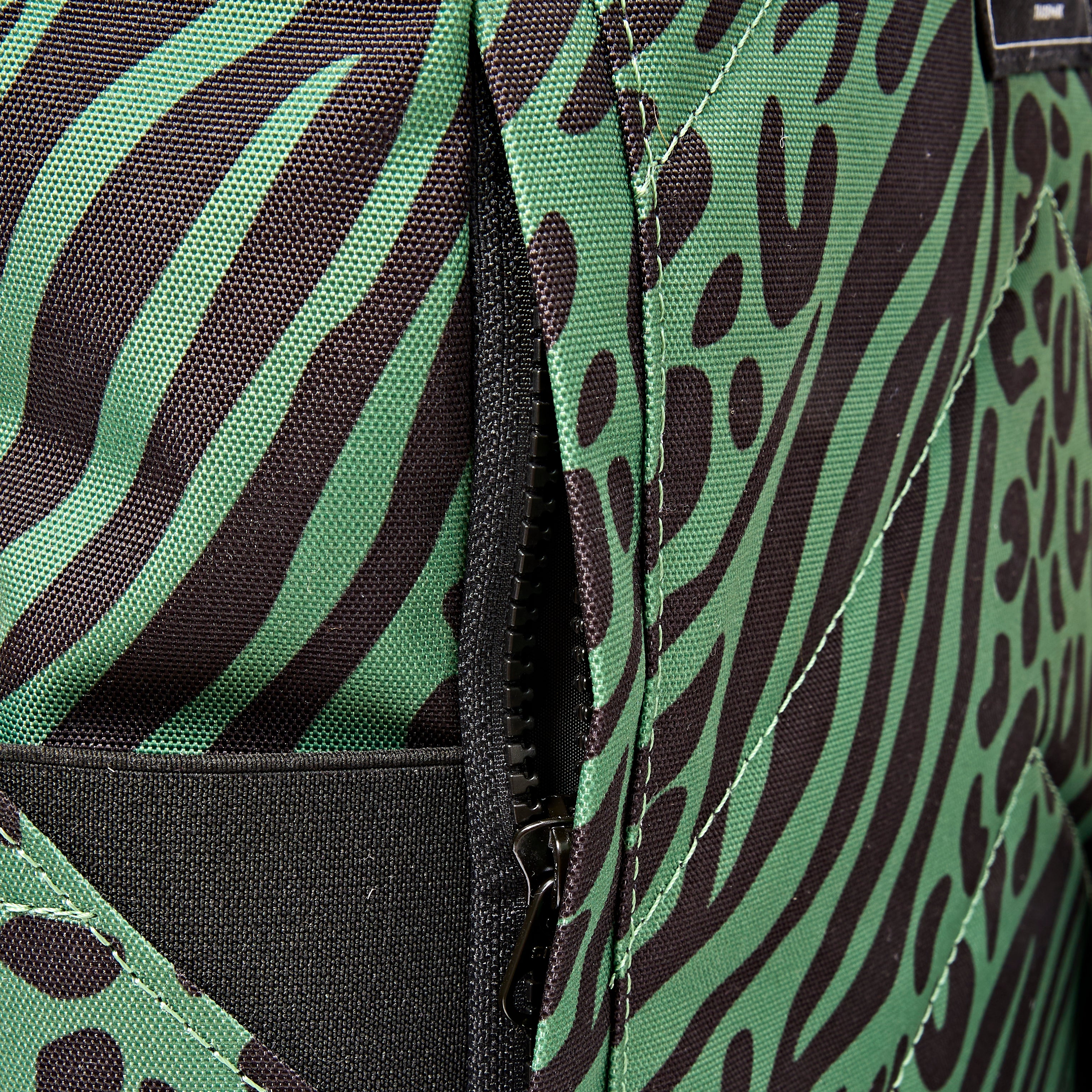ROKA Canfield Roll Top Medium Backpack – Mixed Animal Artichoke Recycled Canvas at Bibelot Leek UK Stockist