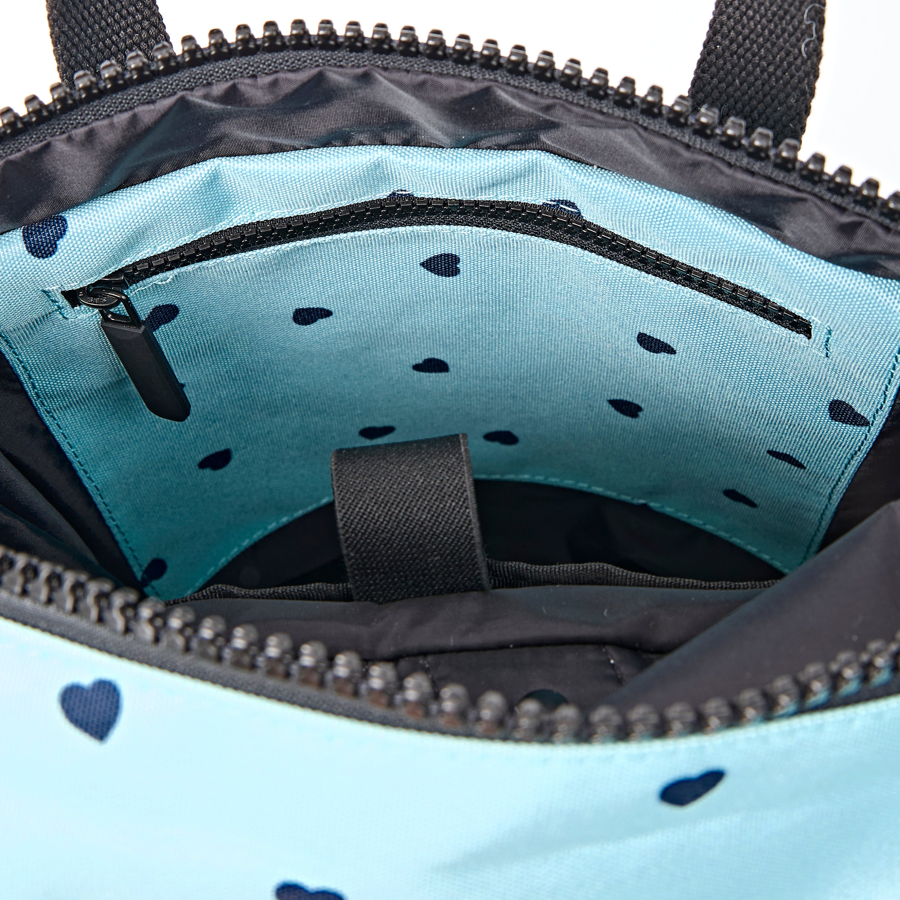 ROKA Canfield Roll Top Small Backpack – Heart Print Recycled Canvas at Bibelot Leek UK Stockist