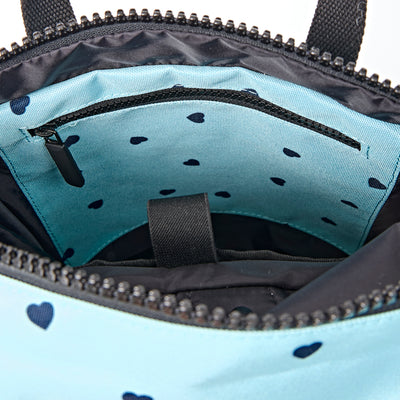 ROKA Canfield Roll Top Small Backpack – Heart Print Recycled Canvas at Bibelot Leek UK Stockist