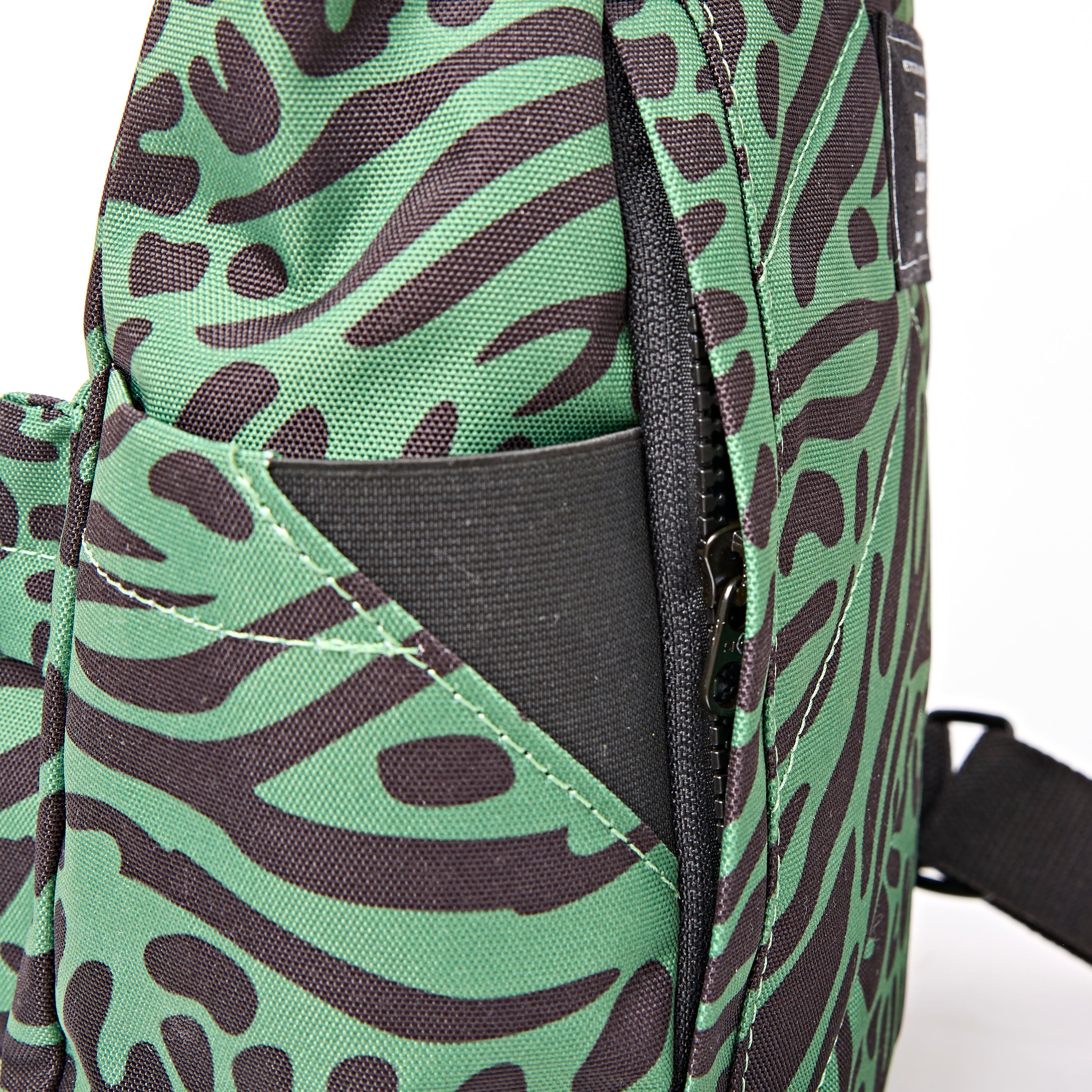 ROKA Canfield Roll Top Small Backpack – Mixed Animal Artichoke Recycled Canvas at Bibelot Leek UK Stockist