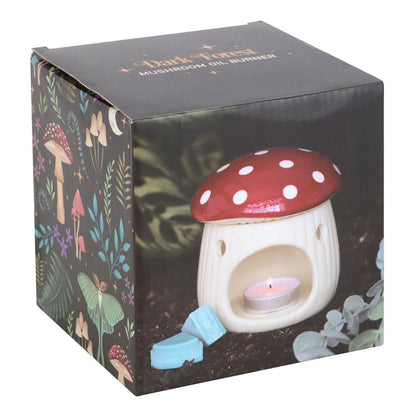 Mushroom-shaped oil burner in packaging with forest design