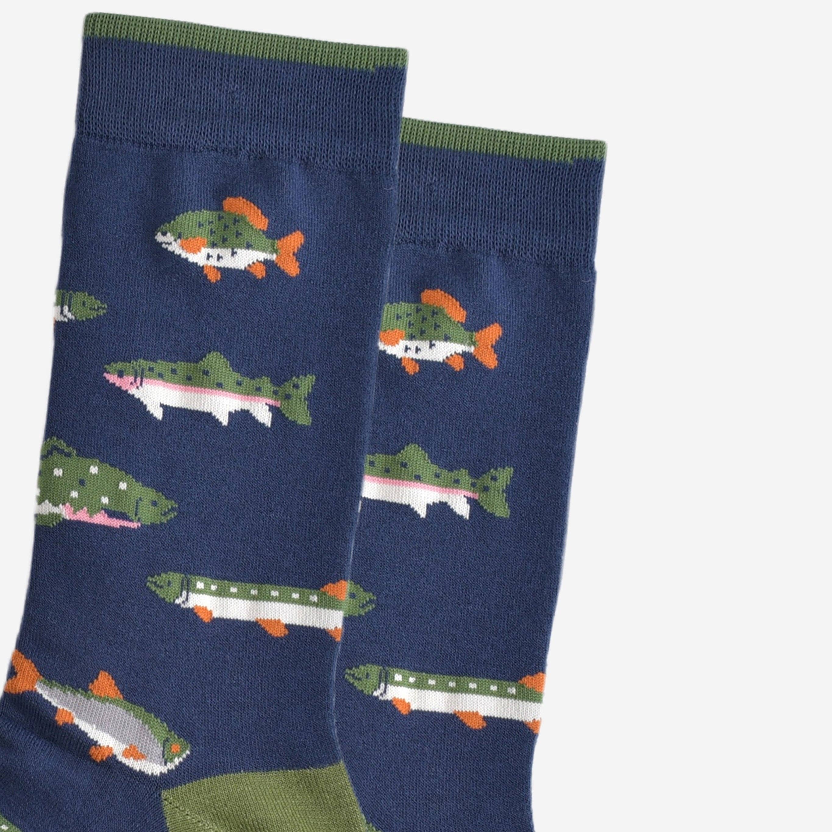 Navy socks with fish pattern on a white background