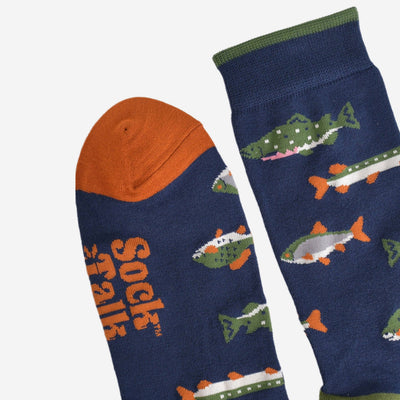 Navy socks with fish pattern and orange accents on a white background