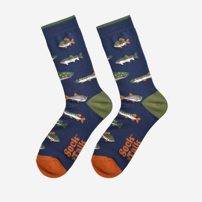 Navy blue socks with fish pattern and orange accents on a white background