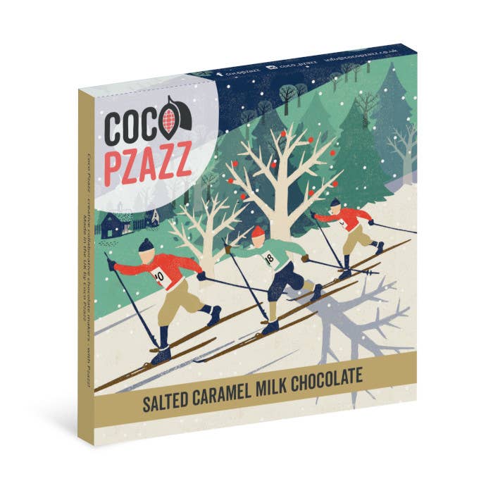 Coco Pzazz salted caramel milk chocolate packaging with skiers in a winter scene.