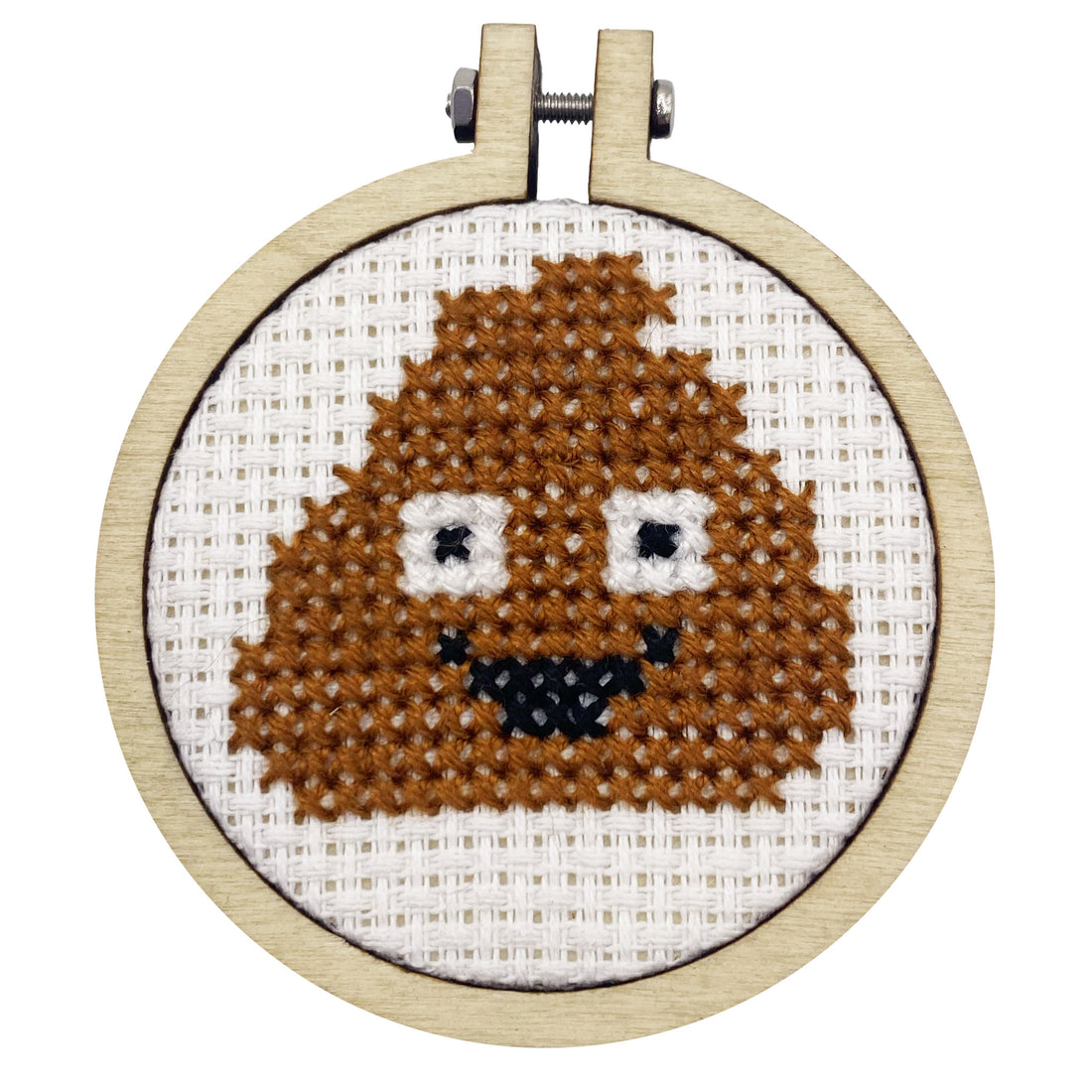 Cross-stitched poop emoji in a wooden hoop on a white background