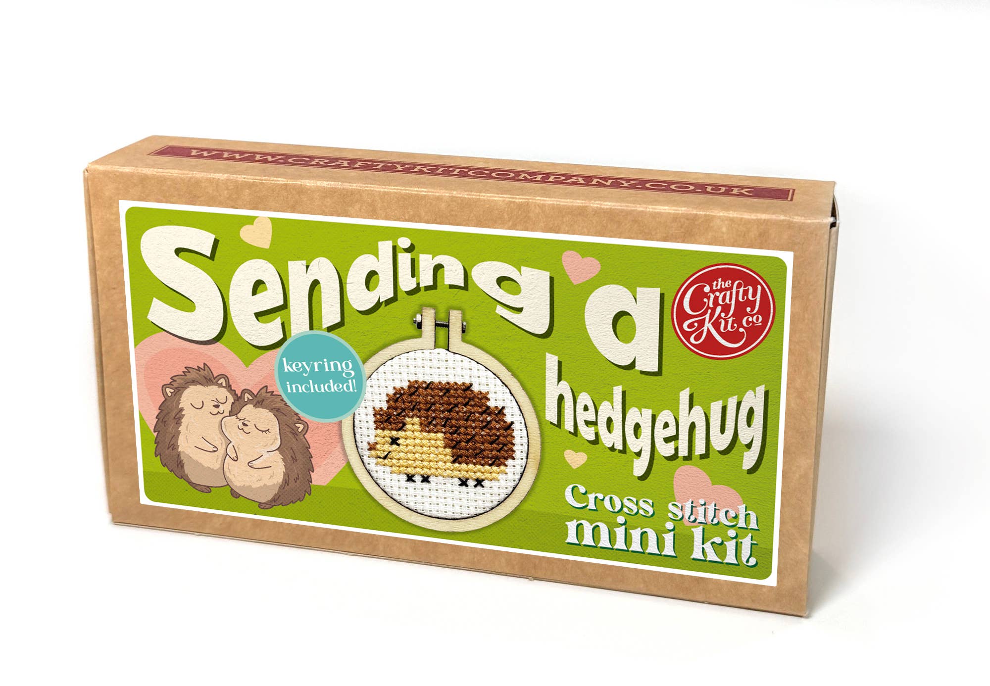 Cross stitch mini kit packaging with hedgehog design on a white background