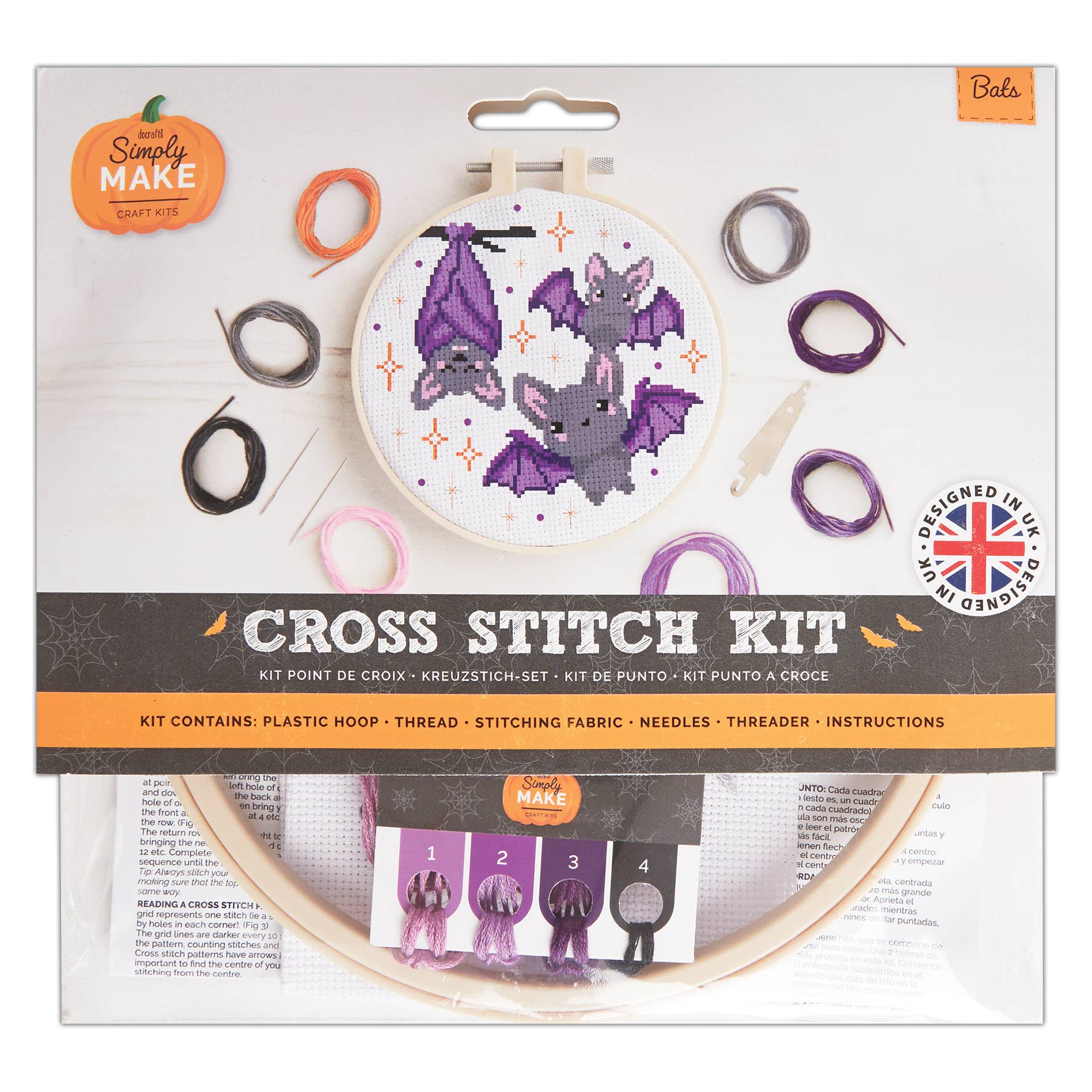 Cross stitch kit packaging with bats design on a white background