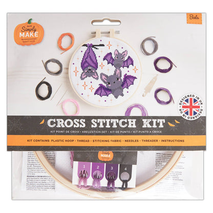 Cross stitch kit packaging with bats design on a white background
