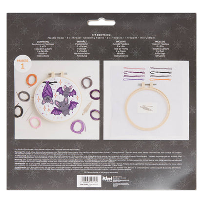 Embroidery kit packaging with bat design on a dark gray background
