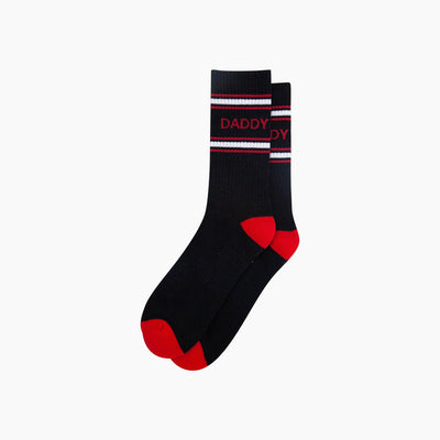 Black socks with red accents and 'DADDY' text on a white background