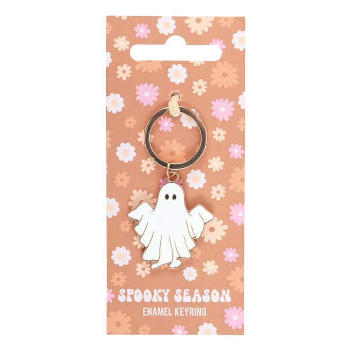 Ghost keychain on a 'Spooky Season' themed packaging with floral design