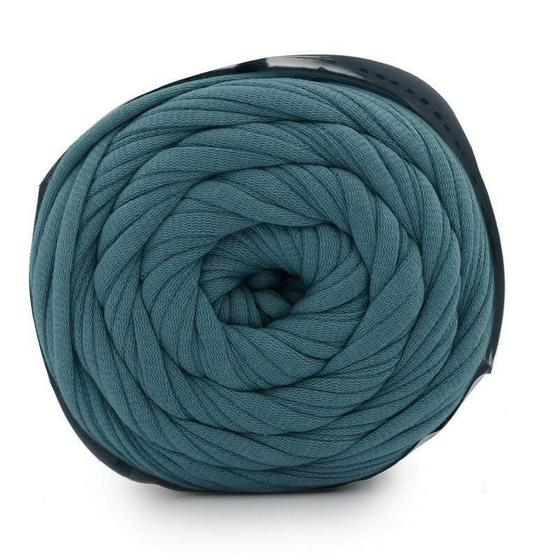 Teal skein of yarn on a white background