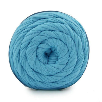 Blue yarn ball on a white background