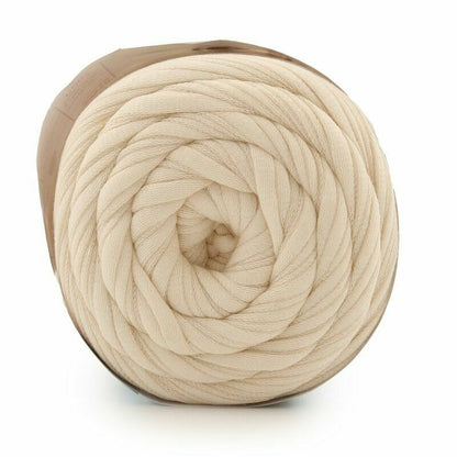 Beige skein of yarn on a white background