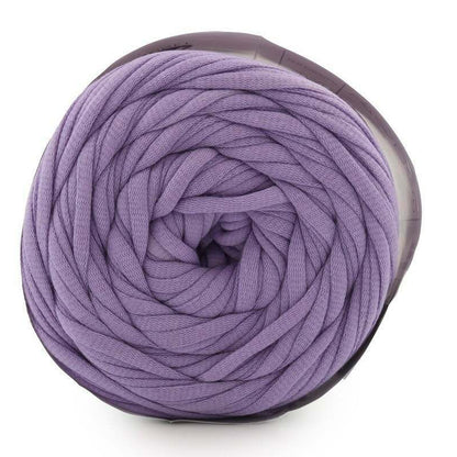 Purple yarn ball on a white background